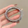Diadema Elástica de Ponytail de Moda para Mujer, Goma para el Cabello Satinada de Gama Alta, Puesto del Mercado Nocturno, Goma Elástica de Bajo Precio al por Mayor