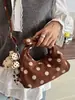 Bolso de mano de lunares de nicho estilo coreano transfronterizo para mujer, nuevo 2026 súper popular, bolso versátil de moda para hombro y cruzado