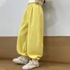 Calça esportiva infantil 2026 nova estilosa calça de moletom infantil estilo primavera e outono calça jogger casual para crianças maiores transfronteiriça