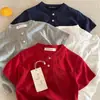 Camisetas de Manga Curta de Verão para Meninos e Meninas Bebê Estilosas Personalidade Infantil Moda Tendência Estilo Coreano Cor Sólida Botões Celebridade da Internet Manga Meia