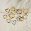 Pendientes minimalistas de acero inoxidable transfronterizos europeos y americanos, pendientes geométricos de hexágono dorado, aros de acero de titanio únicos y versátiles