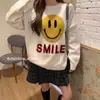 Suéter holgado a la moda estilo coreano que reduce la edad 2026 otoño e invierno ropa para mujer cara sonriente cuello redondo estilo casual para mujer