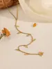 Collar Largo de Acero Inoxidable Transfronterizo Europeo y Americano, Colgante de Hoja de Acero de Titanio Chapado en Oro de 18 Quilates, Joyería Larga con Borlas para Mujer de Vacaciones