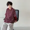 Tong Ku Roupa Infantil 2026 Outono Novo Estilo Coreano Falso Duas Peças Camisa Polo Infantil Versátil Listrada Solta Camiseta Infantil