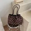 Bolsa de balde super popular com bolinhas para mulheres, nova tendência 2026 outono casual moda versátil para trabalho ombro e transversal