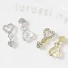 Accesorios para Uñas con Colgante de Corazón de Aleación Popular Transfronterizos, Corazones Metálicos Huecos Súper Brillantes para Uñas, Decoraciones para Uñas de Celebridad de Internet al por Mayor
