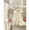 Vestido con Cuello Peter Pan para Niña 2026 Verano Nuevo Estilo Vestido de Princesa de Lunares para Niños Vestido con Chaleco de Encaje Elegante para Bebé