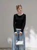 Suéter patchwork slim fit de alta qualidade, estiloso e que valoriza a silhueta feminina, perfeito como peça base para outono/inverno ou como um top de tricô.