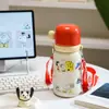 Botella de agua térmica Snoopy de acero inoxidable 316, diseñada para niñas, con un aspecto elegante, perfecta para que los estudiantes la usen en la escuela, cuenta con un asa para transportarla fácilmente y una tapa de tipo pop-up