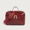 Bolsa de Mujer Nueva Otoño e Invierno 2025 Piel Sintética Brillante con Acabado Aceitoso Bolsa de Maquillaje Hombro Único Cruzada Transfronteriza de Moda Bolsa para Lonchera Generación