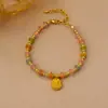 Pulsera con colgante de cuarzo rosa de cristal de colores y diseño de fresa, pulsera para niña de alta gama y lujo, venta al por mayor