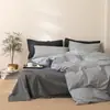 Juego de cuatro piezas de algodón 100% teñido en hilo y lavado, algodón puro, sin marca, suministrado por el fabricante, funda de edredón de alta calidad, sábana bajera de estilo japonés, ropa de cama al por mayor