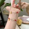 Pulsera tejida hecha a mano estilo chino original para DIY con cristal rosa natural, jade Hetian y ágata, con un lindo diseño de caricatura