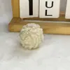 Venta directa de fábrica de accesorios de bola de pelo de cordero sintético para fundas de teléfono, colgantes de juguete para Crocs, accesorios coloridos de bricolaje, bolas de oso de peluche