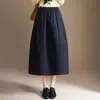 Falda casual de moda de longitud media tipo tulipán con cintura elástica, falda linterna que cubre la cadera y estiliza, falda para ir al trabajo de otoño 2026