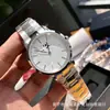 D W pareja más vendido nuevo reloj de cuarzo moda simple hombres y mujeres relojes fabricantes en stock venta al por mayor generación