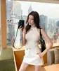 Shenzhen Nanyou 26 Nuevo Estilo de Verano Bordado de Letras Miu Falda Corta de Traje de Cintura Alta Adelgazante que Cubre la Cadera Versátil Falda de Línea A para Ir al Trabajo