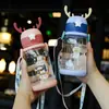 Nueva taza de plástico con diseño de asta de dibujos animados de gran capacidad, con correa para niños, taza portátil que rebota, taza linda con pajilla al vacío, venta al por mayor