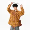 Camisa a cuadros estilo americano color amarillo dopamina para hombres y mujeres, cárdigan versátil de marca moderna, chaqueta superior con protección solar para parejas