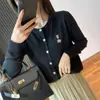 Cárdigan de punto con mangas largas de oso blanco para mujer, abrigo, nuevo top corto negro holgado para otoño e invierno 2024