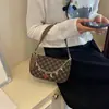 Bolsa Quadrada Pequena Estilo Novo 2026 Versátil Bolsa de Mahjong Bolsa de Mão Estilosa Bolsa Transversal Bolsa Feminina Fashion Bolsa de Ombro/Axila