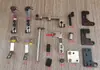 Accesorios para máquinas de bordar por computadora: abrazadera de rosca, cortahilos, placa de montaje de electroimán, eje de cuchilla, manguito de eje, almohadilla de amortiguación