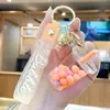 Chaveiro criativo e moderno de copo de milk tea arco-íris e garrafa de areia líquida, acessório fofo para bolsa, chaveiro requintado para carro