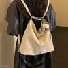 Nuevo estilo de moda para mujer, otoño, exquisito, 2026, mochila de gamuza con colgante, terciopelo, bolso de mano, bandolera coreana, estilo de dibujos animados