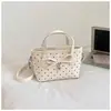 Bolsa de poá de nicho super popular para mulheres, novo estilo 2026, bolsa transversal versátil e da moda, bolsa balde requintada, bolsa de mão
