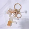 Llavero Colgante de Borla con Letra Inglesa Personalizada de Purpurina Blanca con Resina Epoxi y Colgante de Resina con Pan de Oro, Llavero Sencillo