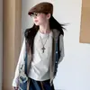 Traje de mezclilla estilo Hong Kong para niñas, nuevo modelo otoño 2026 para niños mayores, incluye una camiseta base, un chaleco con capucha deshilachado y pantalones de pierna ancha
