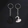 Pingente Casal Europeu e Americano Transfronteiriço Novo Aço Inoxidável Gato Preto e Branco Coração Costurado Joias Masculinas e Femininas Atacado