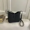Bolso Pequeño Retro de Alta Gama para Comercio Exterior para Mujer 2026 Nuevo Bolso Cruzado Versátil de Moda Bolso de Mano de Lunares Bolso Cubo