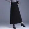 Falda versátil de color liso para mujer, nueva moda otoño e invierno 2026, de cintura alta, adelgazante, que cubre las caderas, larga, línea A, moderna
