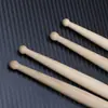 Baquetas de nogueira norte-americana com design de ponta em gota d'água para bateristas profissionais praticarem e se apresentarem com uma sensação confortável