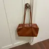 Nova bolsa de mão feminina 2026, elegante, retrô, casual, para o dia a dia, cor sólida, grande capacidade, alta qualidade, uma bolsa tote visualmente atraente