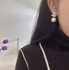 Presilha de orelha estilo Chanel com pérola dupla C para mulheres, brincos únicos de luxo leve de alta qualidade, nova joia de orelha popular para outono e inverno 2023