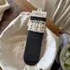 Calcetines de Malla Fina Estilo Cremoso Songmu con Patrón Sutil, Borde Fruncido, Accesorios de Lazo, Calcetines Blancos de Algodón a Media Pantorrilla