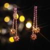 Europa y Estados Unidos temperamento transfronterizo brillante diamantes completos magníficos aretes largos mujeres moda aretes de alto sentido joyería para la oreja al por mayor
