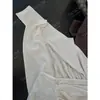 [Destacado] Yuran 26 Nueva Colección de Principios de Otoño: Conjunto de punto con hombro asimétrico y manga larga, mezcla de acetato, con falda midi de abertura lateral