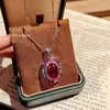 Set Exagerado de Imitación de Rubí Sangre de Paloma Brillante Europeo y Americano Colgante de Zircón Huevo de Paloma Pendientes de Botón de Piedra de Color Anillo Abierto