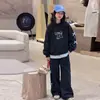 Conjunto de Niña con Lazo Otoño 2026 Nueva Moda de Alta Calidad Casual Principios de Otoño Sudadera Conjunto de Dos Piezas para Niñas Pequeñas