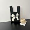 Bolsa Tricotada com Senso Avançado Nova Bolsa de Pulso de Desenho Animado Bolsa de Férias Bolsa de Mão Nicho Versátil Bolsa de Mão Bolsa de Presente