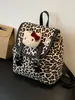 Mochila unisex de moda transfronteriza con estampado de leopardo y diseño de gatito de dibujos animados, mochila escolar para estudiantes, nuevo modelo 2026 mochila de viaje para niños