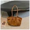 Bolso tote de acabado mate transfronterizo, bolso de hombro de gran capacidad para mujer, bolso de mano de alta gama, nicho, estilo vintage, y bolso de axila