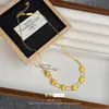 Diseño de Nicho Alto Valor de Color Láser Doble Fila Trébol de Cuatro Hojas Traje para Mujer Lujo Ligero Exquisito Collar Pulsera de Trébol de Cuatro Hojas