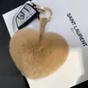 Colgante de Bolsa Lindo con Forma de Corazón de Piel de Conejo Llavero de Corazón de Felpa Bola de Piel con Forma de Corazón de Gama Alta Venta al por Mayor desde el Fabricante