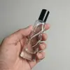 En stock botella de perfume de vidrio irregular con forma de ola de 10 ml botella de spray portátil para decantar botella de perfume vacía de línea retorcida