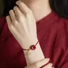 Pulsera de Cuerda Roja Tejida a Mano con Hebilla Ping An de Cinabrio Marca Fu Estilo Étnico Pulsera Roja de Cuerda para el Año de la Vida Pulsera Regalo para Estudiantes