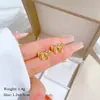 [Acero de titanio para todo el cuerpo] pendientes minimalistas de lazo desgastado pendientes fríos para hombres y mujeres pendientes de banquete con temperamento personalizado